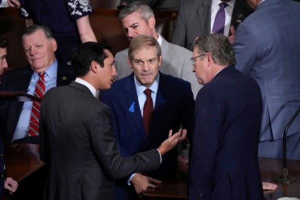 Rep. Jim Jordan, R-Ohio, center, co<em></em>nfers with staffer John Leganski, left, and Rep. Thomas Massie, R-Ky., right, after he lost the second round of balloting for House speaker, failing to co<em></em>nvince his Republican detractors to support him to replac<em></em>e the ousted Kevin McCarthy, at the Capitol in Washington, Wednesday, Oct. 18, 2023. (AP Photo/J. Scott Applewhite)