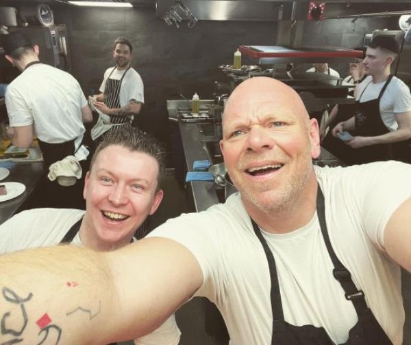 Story from Jam Press (Kerridge Fish Rise) Pictured: Tom Kerridge. Tom Kerridge INCREASES price of his posh fish and chips despite backlash Tom Kerridge has INCREASED the price of his posh fish and chips despite a backlash. The telly chef is now charging 37 for the classic English favourite dish. His Market Day Fish meal is served up at Kerridge Fish and Chips at Harrods. Other items on the menu have also increased including coleslaw and peas. The 50-year-old was slammed in June when the fish served with a<em></em>bout eight chips came on sale for 35. But the 2 price hike has now come after just four months. The Market Day Fish is ?caught from day boats in Cornwall.? It comes ?deep-fried? in ?Kerridge?s gluten-free batter? and is served with ?chips, Matson curry sauce, tartare sauce and pease pudding.? He has also added 1 to his Kerridge?s Hand-cut Triple-Cooked Chips. They used to be 8.50 now they are 9.50. This is the same new price for his Cornish New Potatoes with Herb Butter which have also gone up a quid. Kerridge?s Minted Peas and Hardcore Slaw were both 7.50 but are now 8.50 each. A Whole Lobster has gone up by 15, it used to be 65 and now it?s 80. Mo<em></em>nkfish Scampi is now cheaper, just 42 instead of 49. Foodies have slammed his Harrods prices. One fumed: ?What planet is he on, thereis a cost of living crisis. ?Who can afford his prices Phil Chadwick said: ?Better off doing your own.? Another - named Julie - added: ?Too expensive.? The Harrods website reads: ?British meals don?t get more classic than fish and chips. ?For young and old alike, the crunch of batter encasing tender fish together with a chunky chip dipped in ketchup is the ultimate heartwarming nod to comfort and nostalgia. ?Trust in Tom Kerridge to take the UK?s favourite dish to new heights at his epo<em></em>nymous restaurant. ?On the menu created by one of the UK?s best-loved chefs, you?ll find Britain?s
