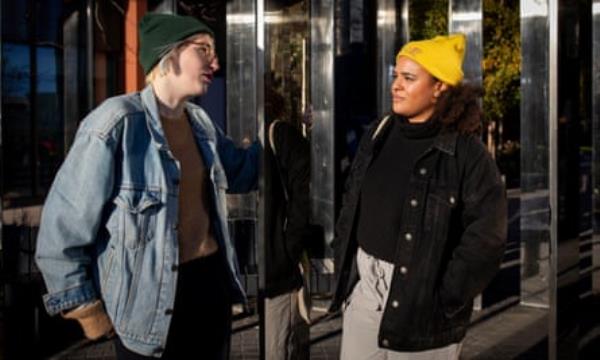 Hannah with Nikita both wearing beanies