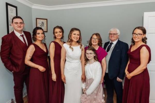 Noreen Loo<em></em>ney with her parents Mary and Ger Looney, daughter Lily Drumm and bridal party Co<em></em>nor Cronin, Tracey Sheahan, Niamh Sexton and Mairead O’Sullivan. 