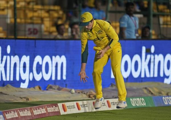 Glenn Maxwell of Australia makes his way off after being dismissed.