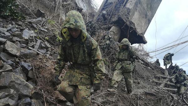 Rescue teams still at work six days after Japanese earthquake