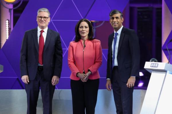 British opposition Labour Party leader Keir Starmer, British Prime Minister Rishi Sunak and Mishal Husain pose on the day of BBC's Prime Ministerial Debate, in Nottingham, Britain