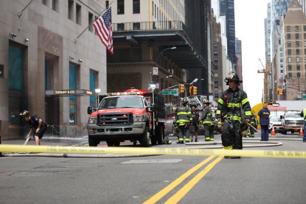 Firefighters in New York City have tackled a blaze at Tiffany & Co's ico<em></em>nic jewelry store in New York on June 29.