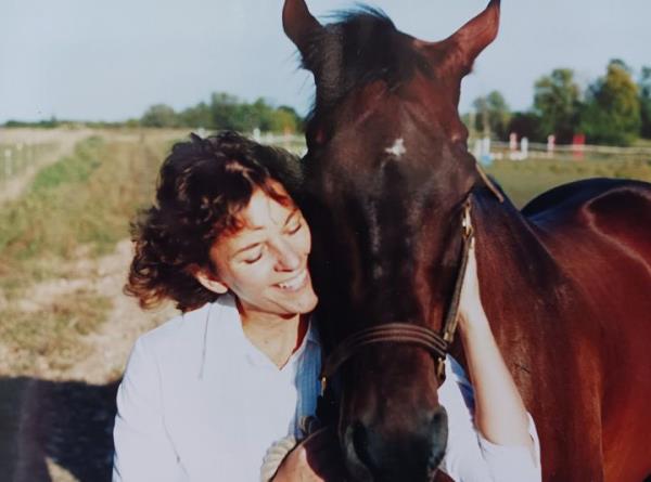 “I was an awkward girl who had trouble forming bo<em></em>nds with classmates,” the author writes. “So, I escaped to a local riding stable wher<em></em>e I forged friendships with horses. I remain enamored of them.”