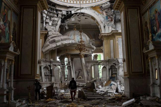 Church perso<em></em>nnel inspect damages inside the Odesa Transfiguration Cathedral in Odesa, Ukraine, Sunday, July 23, 2023, following Russian missile attacks. (AP Photo/Jae C. Hong)